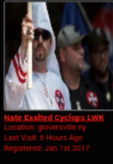 A screenshot of a profile for a KKK member identified as 'Nate Exalted Cyclops LWK' from Gloversville, NY. The photo shows a man in a white KKK robe and hood, wearing sunglasses and a goatee.