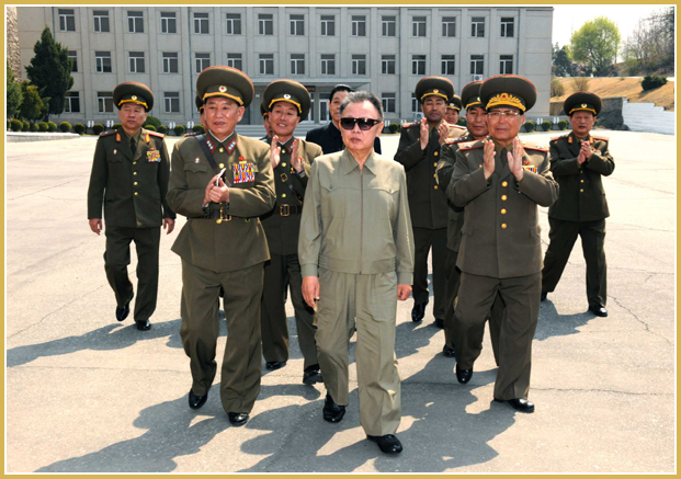 North Korean Reconnaissance General Bureau chief General Kim Yong Chol (l) with then North Korean supreme leader Kim Jong Il on a visit to the the RGB military unit headquarters in 2010
