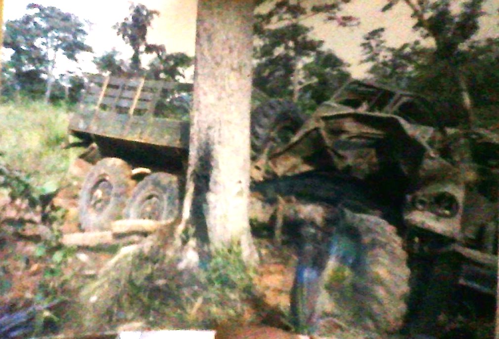 Photo of Russian Zil 2 1/2 ton military transport truck I was riding in after it drove over two Chinese anti-tank mines, in northwest Cambodia. I was sitting in the front seat of the vehicle captured hours earlier from government forces. Both soldiers sitting on either side of me were killed. I woke up in the engine compartment with a severed leg across my face. It wasn't mine. It was the driver's, now sitting a few yards in the mud holding the stump of his thigh and crying out for his mother. This pic was taken the following morning by soldiers who returned to retrieve the bodies of the dead we left behind to walk 7 miles carrying wounded to the nearest guerrilla base.