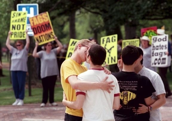 Counter protesters at Westboro Baptist Church demonstration at funeral of victims of gay violence