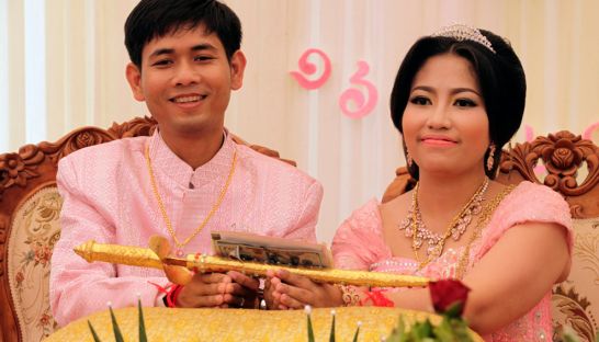 Pol Pot's daughter poses with her groom Sunday March 16, 2014 during a lavish wedding ceremony in western Cambodia. Photo Phnom Penh Post