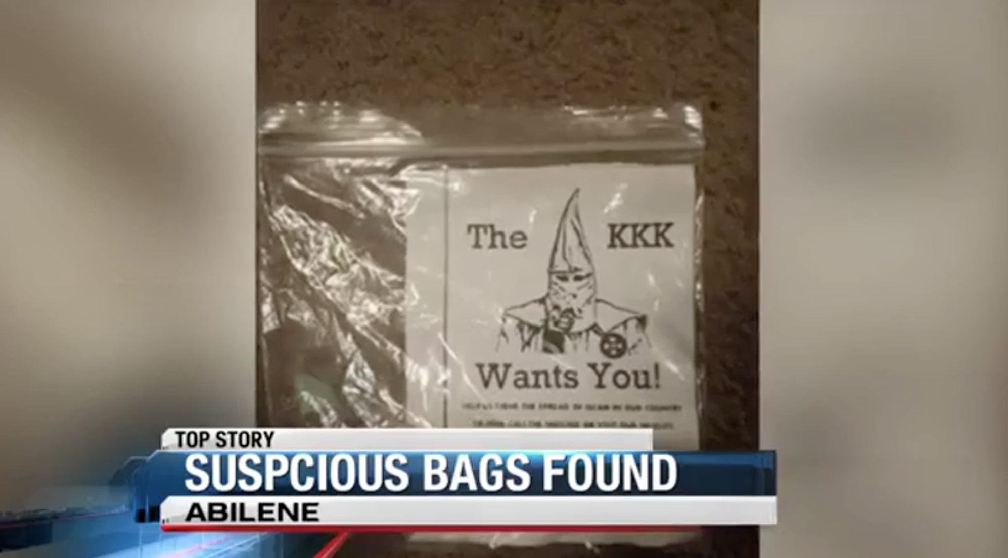 A news broadcast screenshot showing a plastic bag containing a KKK recruitment flyer that says 'The KKK Wants You!' with a news banner below stating 'SUSPICIOUS BAGS FOUND ABILENE'.