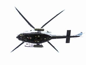A low flying helicopter taking baseline radiation survey