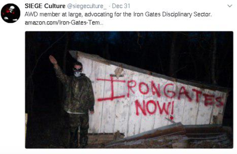 A screenshot of a tweet from SIEGE Culture featuring a person in camouflage and a face mask performing a Nazi salute next to graffiti that reads 'IRON GATES NOW!'.