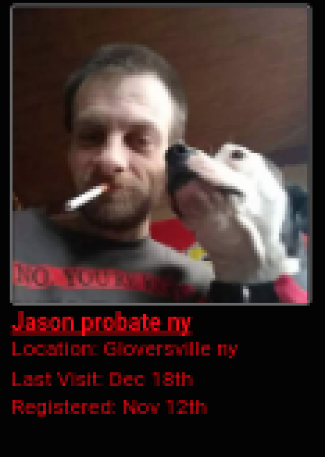A screenshot of a digital profile featuring a photograph of a man with short brown hair and a beard smoking a cigarette next to a white dog. Red text below the image identifies the user as 'Jason probate ny' from Gloversville, NY.