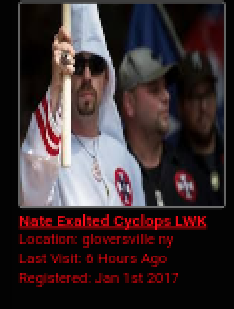 A screenshot of a profile for a KKK member identified as 'Nate Exalted Cyclops LWK' from Gloversville, NY, featuring a man in a white KKK robe and hood.