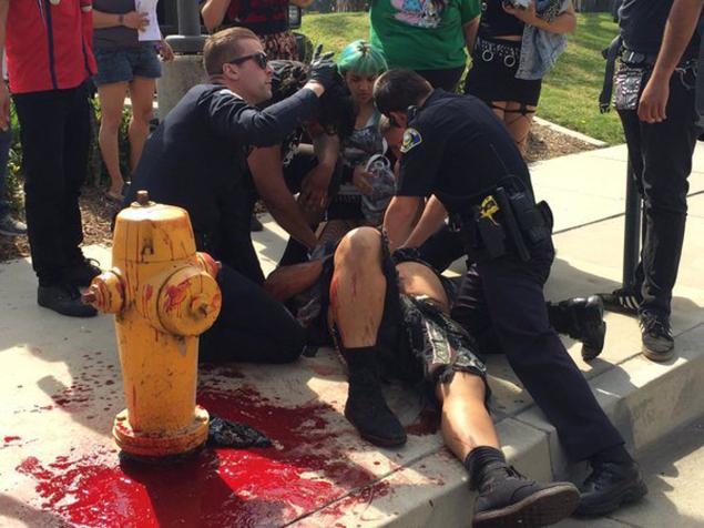 An injured protestor. It was unclear whether the man was KKK or a counter protestor