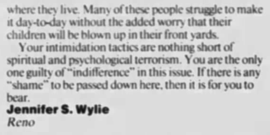 A black and white close-up of a printed text snippet. The text discusses intimidation tactics and spiritual terrorism, ending with the signature 'Jennifer S. Wylie, Reno'.
