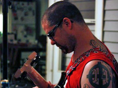 Wade Michael Page and his Celtic Cross tattoo with the neo Nazi symbol