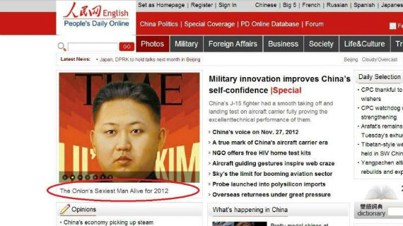 A screenshot of the People's Daily Online website featuring a photo of Kim Jong Un with a red circle around the caption 'The Onion's Sexiest Man Alive for 2012'.