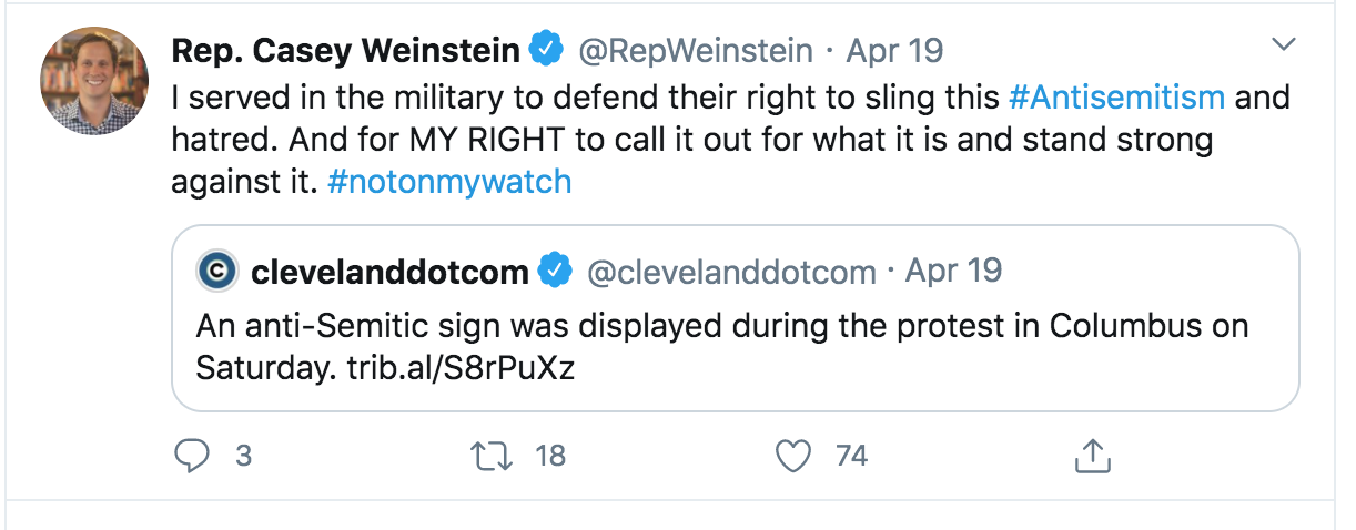 A screenshot of a tweet by Rep. Casey Weinstein responding to a clevelanddotcom tweet about an anti-Semitic sign at a protest in Columbus, Ohio.