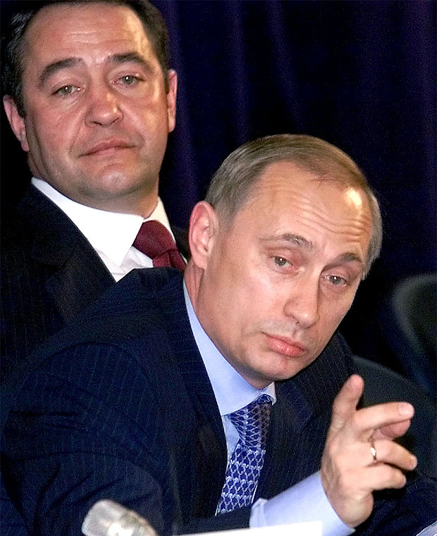 Mikhael Lesin with Putin in more pleasant times