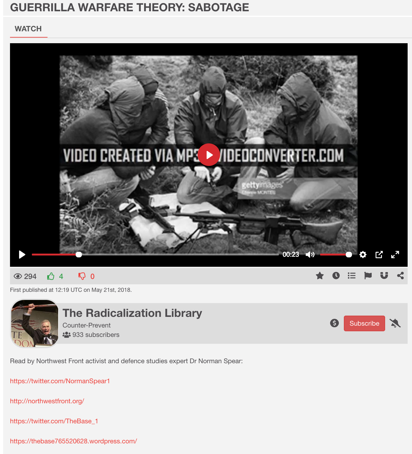 A screenshot of a video player on a website titled 'GUERRILLA WARFARE THEORY: SABOTAGE'. The video frame shows three individuals in hooded parkas looking at a map or equipment in a field. The channel is 'The Radicalization Library' and the description mentions 'The Base' and 'Northwest Front'.